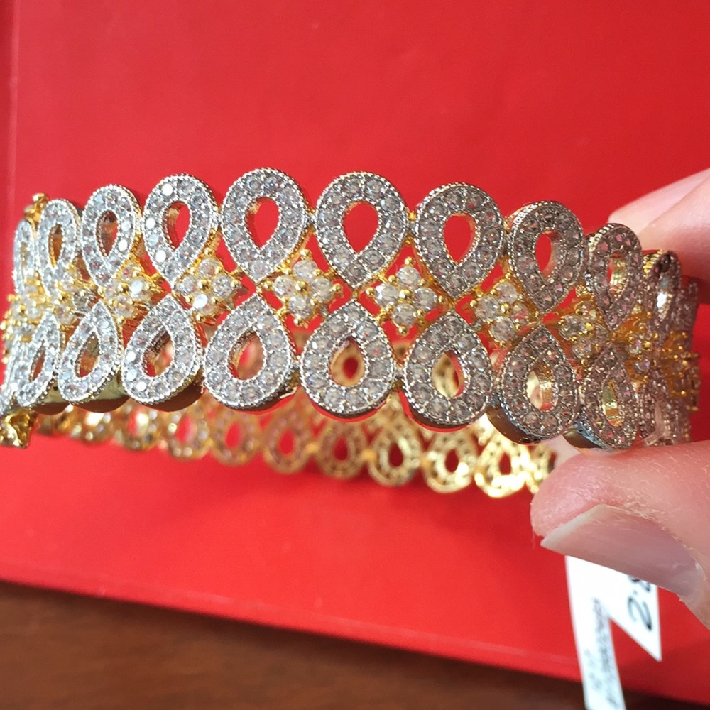 Gold bracelet with rhinestones